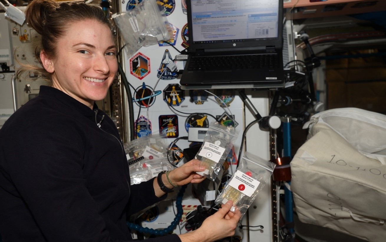 NASA Astronaut Kayla Barron uses a self-service microbial culture kit on board the ISS ©NASA 