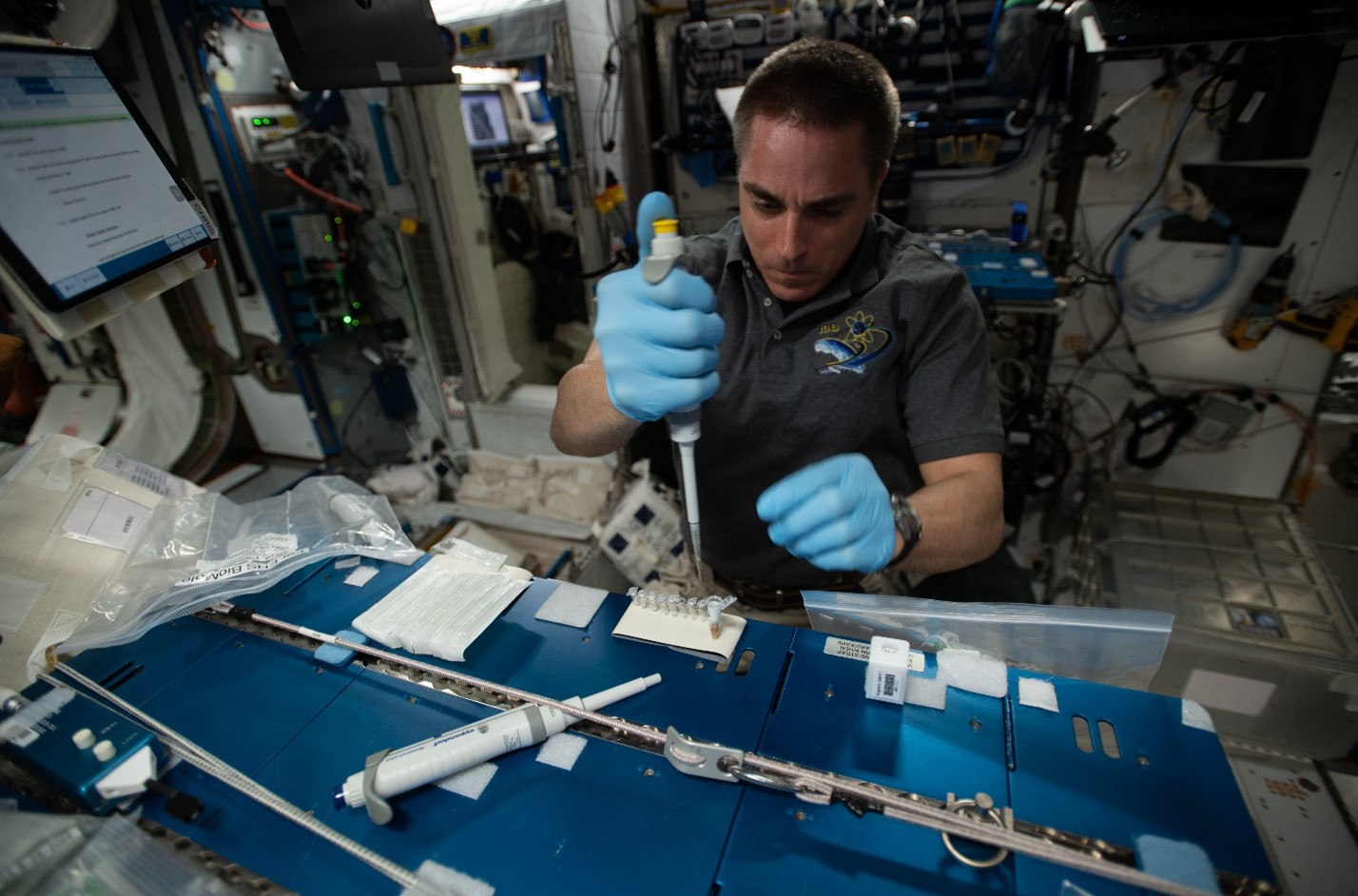 NASA Astronaut Chris Cassidy performs real-time, swap-to-sequencer microbial monitoring onboard the ISS ©NASA